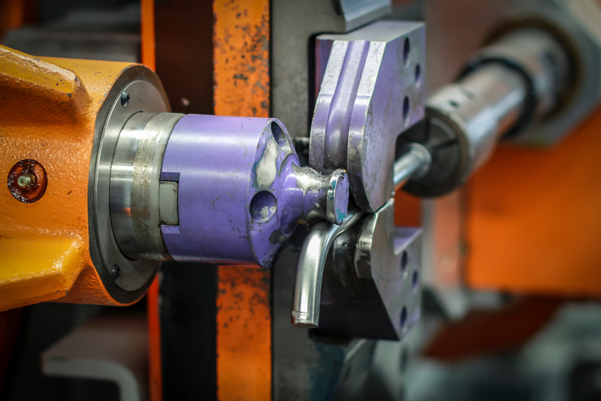 Detailed view of a metal cutting machine in operation